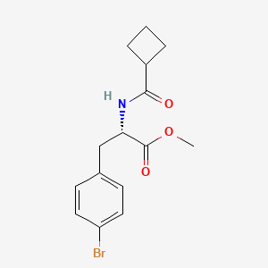 molecular formula C15H18BrNO3 B8127676 S 3-(4-Bromo-phenyl)-2-(cyclobutanecarbonyl-amino)-propionic acid methyl ester 