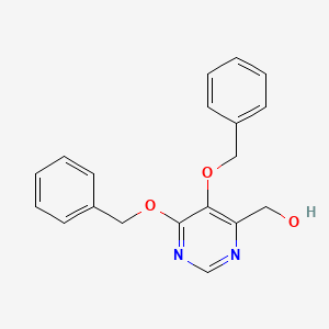 molecular formula C19H18N2O3 B8127771 (5,6-Bis-benzyloxypyrimidin-4-yl)-methanol 