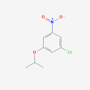 molecular formula C9H10ClNO3 B8128904 1-Chloro-3-isopropoxy-5-nitrobenzene 