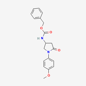 Benzyl (1-(4-methoxyphenyl)-5-oxopyrrolidin-3-yl)carbamate