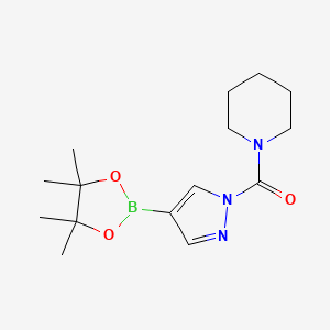molecular formula C15H24BN3O3 B8130987 Piperidin-1-yl-[4-(4,4,5,5-tetramethyl-[1,3,2]dioxaborolan-2-yl)-pyrazol-1-yl]-methanone 