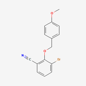molecular formula C15H12BrNO2 B8132712 3-Bromo-2-(4-methoxy-benzyloxy)-benzonitrile 