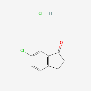 molecular formula C10H10Cl2O B8133250 6-Chloro-7-methyl-2,3-dihydro-1H-inden-1-one HCl 