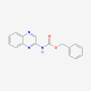 molecular formula C16H13N3O2 B8133888 Benzyl quinoxalin-2-ylcarbamate 