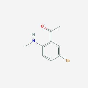 molecular formula C9H10BrNO B8133941 1-[5-Bromo-2-(methylamino)phenyl]ethanone 