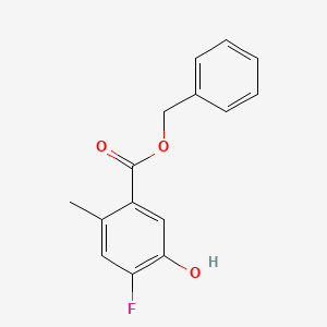 molecular formula C15H13FO3 B8134677 Benzyl 4-fluoro-5-hydroxy-2-methylbenzoate 