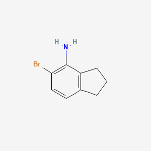 molecular formula C9H10BrN B8136925 5-bromo-2,3-dihydro-1H-inden-4-amine 