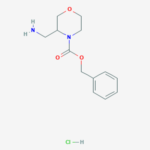molecular formula C13H19ClN2O3 B8137542 Benzyl 3-(aminomethyl)morpholine-4-carboxylate hydrochloride 