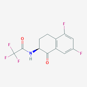 molecular formula C12H8F5NO2 B8137914 (S)-N-(5,7-Difluoro-1-oxo-1,2,3,4-tetrahydronaphthalen-2-yl)-2,2,2-trifluoroacetamide 