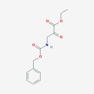 molecular formula C13H15NO5 B8140445 Ethyl 2-oxo-3-(phenylmethoxycarbonylamino)propanoate 