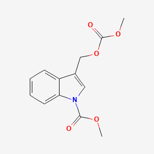 molecular formula C13H13NO5 B8143820 Methyl 3-(((methoxycarbonyl)oxy)methyl)-1H-indole-1-carboxylate 