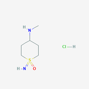 molecular formula C6H15ClN2OS B8144343 1-Imino-4-(methylamino)tetrahydro-2H-thiopyran 1-oxide hydrochloride 