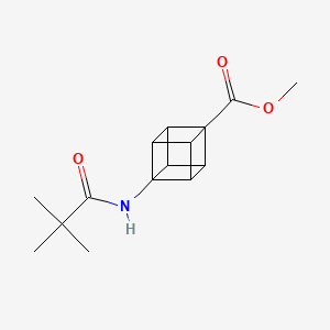 molecular formula C15H19NO3 B8144938 Methyl 4-(tert-butylcarbonylamino)cubanecarboxylate 