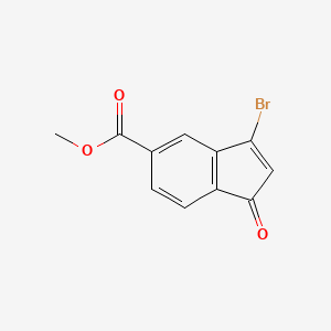 molecular formula C11H7BrO3 B8145316 Methyl 3-bromo-1-oxo-1H-indene-5-carboxylate 