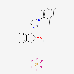 molecular formula C21H25F6N2OP B8146520 1-((1S,2R)-2-Hydroxy-2,3-dihydro-1H-inden-1-yl)-3-mesityl-4,5-dihydro-1H-imidazol-3-ium hexafluorophosphate(V) 