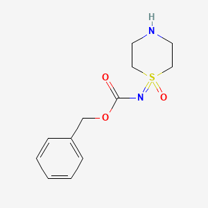 molecular formula C12H16N2O3S B8147563 Benzyl (1-oxidothiomorpholin-1-ylidene)carbamate 