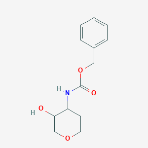molecular formula C13H17NO4 B8147601 (3-Hydroxy-tetrahydro-pyran-4-yl)-carbamic acid benzyl ester 