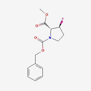 molecular formula C14H16FNO4 B8147942 1-Benzyl 2-methyl (2R,3S)-3-fluoropyrrolidine-1,2-dicarboxylate 