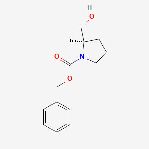 molecular formula C14H19NO3 B8148003 benzyl (2R)-2-(hydroxymethyl)-2-methylpyrrolidine-1-carboxylate 
