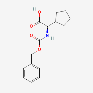 molecular formula C15H19NO4 B8148066 (2R)-2-{[(benzyloxy)carbonyl]amino}-2-cyclopentylacetic acid 