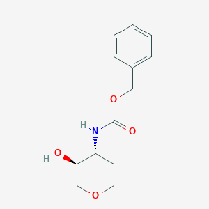 molecular formula C13H17NO4 B8148101 trans-(3-Hydroxy-tetrahydro-pyran-4-yl)-carbamic acid benzyl ester 
