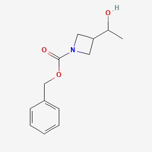 molecular formula C13H17NO3 B8148104 Benzyl 3-(1-hydroxyethyl)azetidine-1-carboxylate 