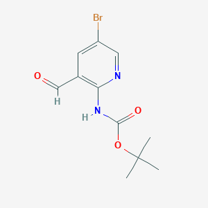 molecular formula C11H13BrN2O3 B8148178 (5-Bromo-3-formyl-pyridin-2-yl)-carbamic acid tert-butyl ester 