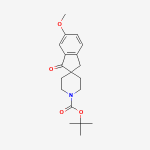 molecular formula C19H25NO4 B8148334 1'-Boc-spiro[6-methoxy-indene-2,4'-piperidin]-1(3H)-one 