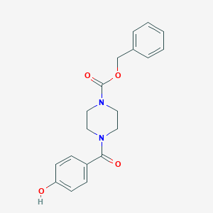 molecular formula C19H20N2O4 B8148343 Benzyl 4-(4-hydroxybenzoyl)piperazine-1-carboxylate 