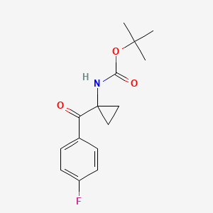 molecular formula C15H18FNO3 B8148439 tert-butyl N-[1-(4-fluorobenzoyl)cyclopropyl]carbamate 
