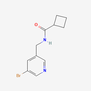 molecular formula C11H13BrN2O B8149208 N-((5-bromopyridin-3-yl)methyl)cyclobutanecarboxamide 