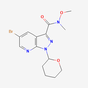 molecular formula C14H17BrN4O3 B8149362 5-bromo-N-methoxy-N-methyl-1-(tetrahydro-2H-pyran-2-yl)-1H-pyrazolo[3,4-b]pyridine-3-carboxamide 