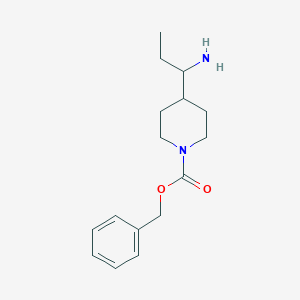 molecular formula C16H24N2O2 B8149638 Benzyl 4-(1-aminopropyl)piperidine-1-carboxylate 