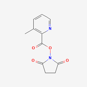 molecular formula C11H10N2O4 B8151251 3-Methyl-pyridine-2-carboxylic acid 2,5-dioxo-pyrrolidin-1-yl ester 
