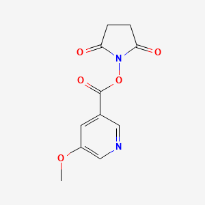 molecular formula C11H10N2O5 B8151290 5-Methoxy-nicotinic acid 2,5-dioxo-pyrrolidin-1-yl ester 