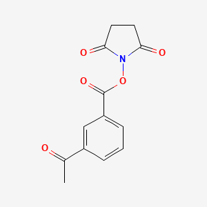 molecular formula C13H11NO5 B8151413 3-Acetylbenzoic acid 2,5-dioxopyrrolidin-1-yl ester 
