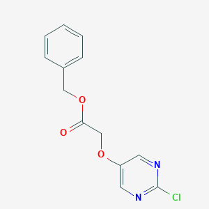 molecular formula C13H11ClN2O3 B8153323 (2-Chloro-pyrimidin-5-yloxy)-acetic acid benzyl ester 
