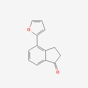 molecular formula C13H10O2 B8155544 4-(Furan-2-yl)-2,3-dihydro-1H-inden-1-one 