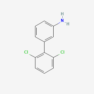 molecular formula C12H9Cl2N B8156847 3-(2,6-Dichlorophenyl)aniline 