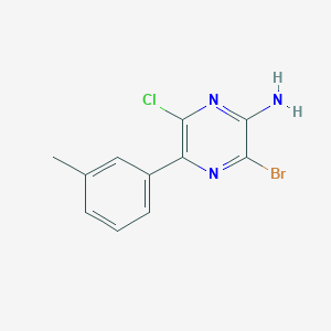 molecular formula C11H9BrClN3 B8157028 3-Bromo-6-chloro-5-(m-tolyl)pyrazin-2-amine 