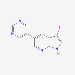 molecular formula C11H7IN4 B8157680 3-Iodo-5-pyrimidin-5-yl-1H-pyrrolo[2,3-b]pyridine 