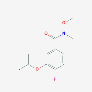 molecular formula C12H16FNO3 B8158032 Benzamide,4-fluoro-N-methoxy-N-methyl-3-(1-methylethoxy)- 