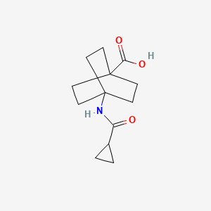 molecular formula C13H19NO3 B8158565 4-(Cyclopropanecarbonyl-amino)-bicyclo[2.2.2]octane-1-carboxylic acid 