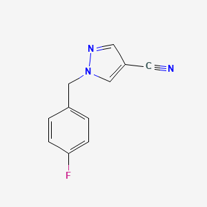 molecular formula C11H8FN3 B8158799 1-[(4-Fluorophenyl)methyl]-1H-pyrazole-4-carbonitrile 