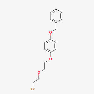 molecular formula C17H19BrO3 B8159798 1-(Benzyloxy)-4-[2-(2-bromoethoxy)ethoxy]benzene 
