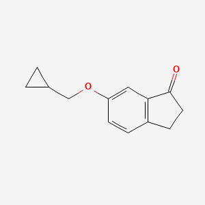 molecular formula C13H14O2 B8160024 6-(Cyclopropylmethoxy)-2,3-dihydro-1H-inden-1-one 