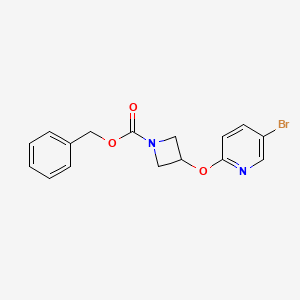 molecular formula C16H15BrN2O3 B8160445 Benzyl 3-((5-bromopyridin-2-yl)oxy)azetidine-1-carboxylate 