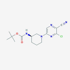 molecular formula C15H20ClN5O2 B8160938 (R)-tert-butyl 1-(6-chloro-5-cyanopyrazin-2-yl)piperidin-3-ylcarbamate 