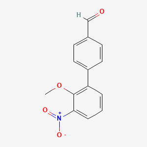 molecular formula C14H11NO4 B8163810 3'-Nitro-2'-methoxy-biphenyl-4-carbaldehyde 