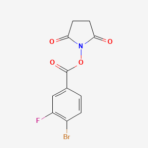 molecular formula C11H7BrFNO4 B8166773 2,5-Dioxopyrrolidin-1-yl 4-bromo-3-fluorobenzoate 